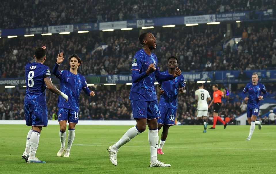 Tosin celebrates his opener for Chelsea