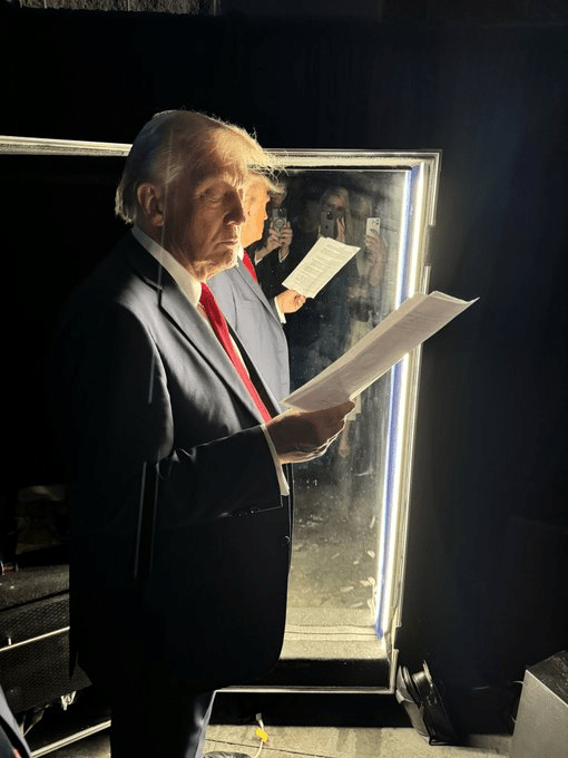 Trump prepares to go on stage after securing his victory