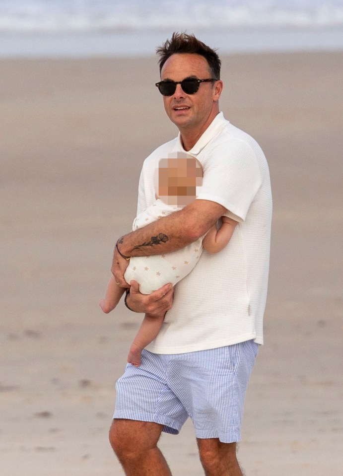 Ant McPartlin looked the ultimate doting dad as he celebrated his birthday on the beach with his son