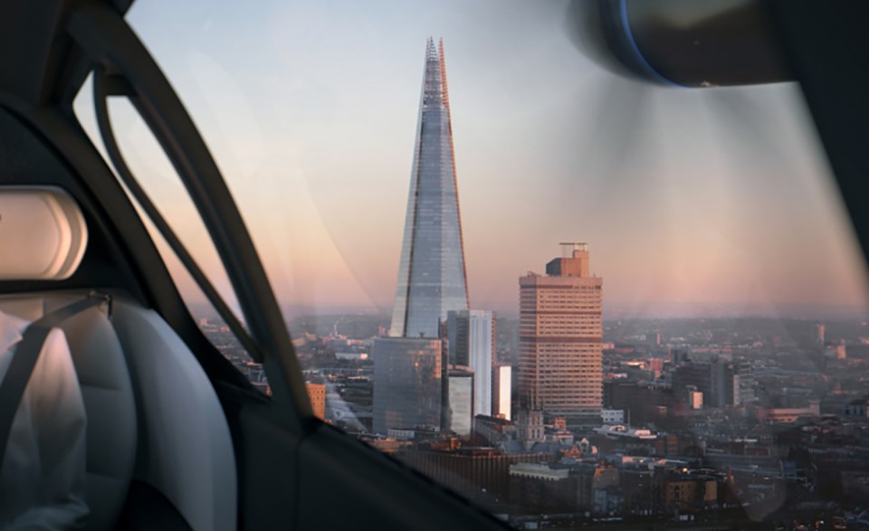 a view of a city from the inside of a car