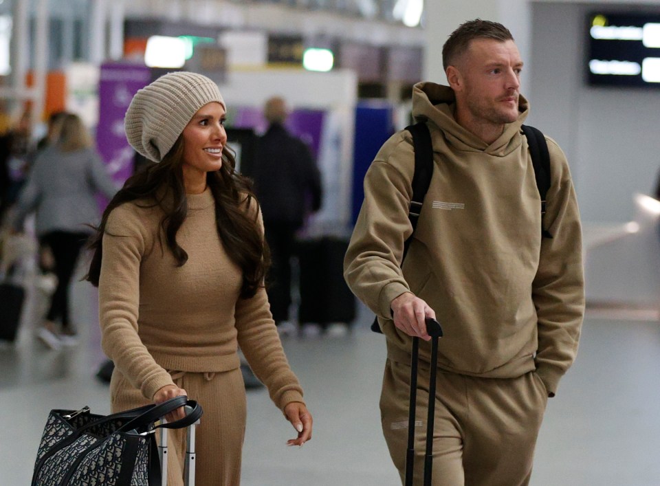 The husband and wife walked through security in matching coloured outfits