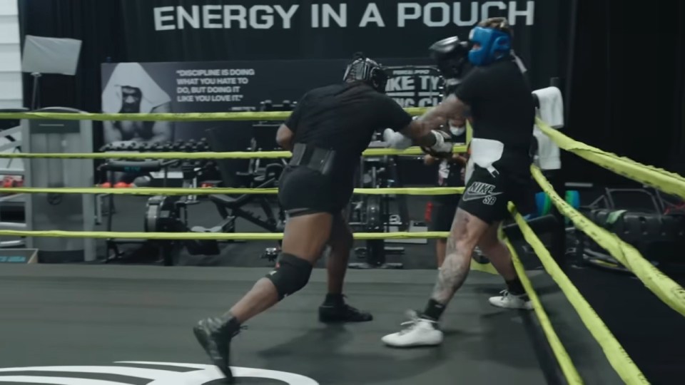 a boxing ring with a sign that says energy in a pouch