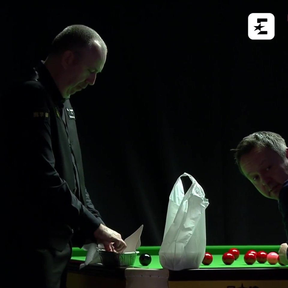 Mark Williams tucked into a Chinese takeaway during the break against Stuart Bingham