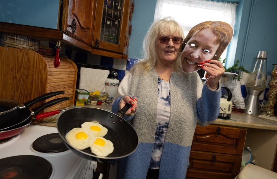 Glenda fries eggs in her kitchen - she's not a fan of omelettes