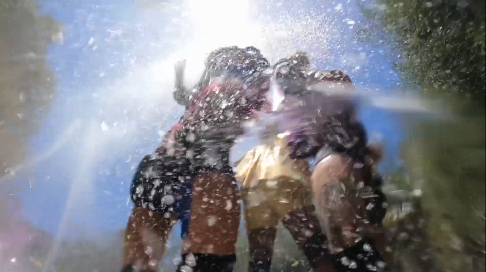 The celebs get doused with water cannons