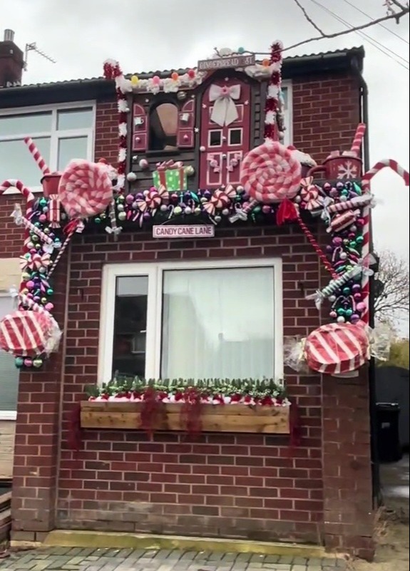 She adds more decorations to her candy cane lane every year