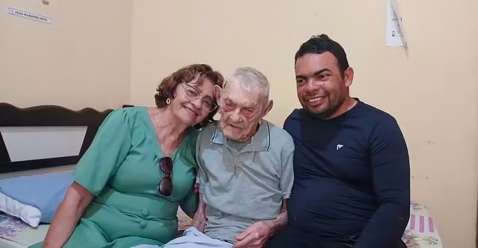 Joao, seen here with his family, allowed TV cameras into his care home over the weekend