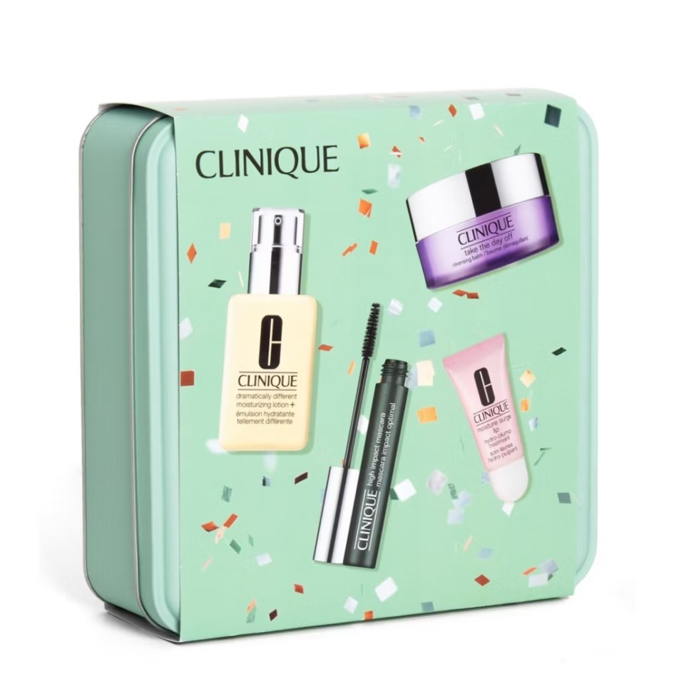 Clinique beauty gift set: moisturizer, cleanser, mascara, and lip treatment.