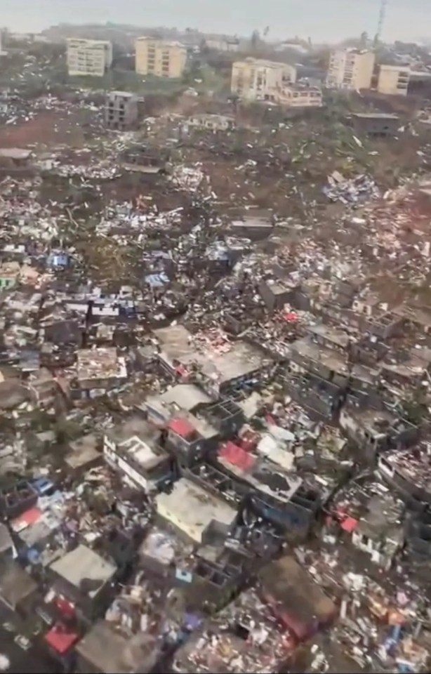 An aerial view of dozens of damaged buildings in the aftermath of the Cyclone Chido