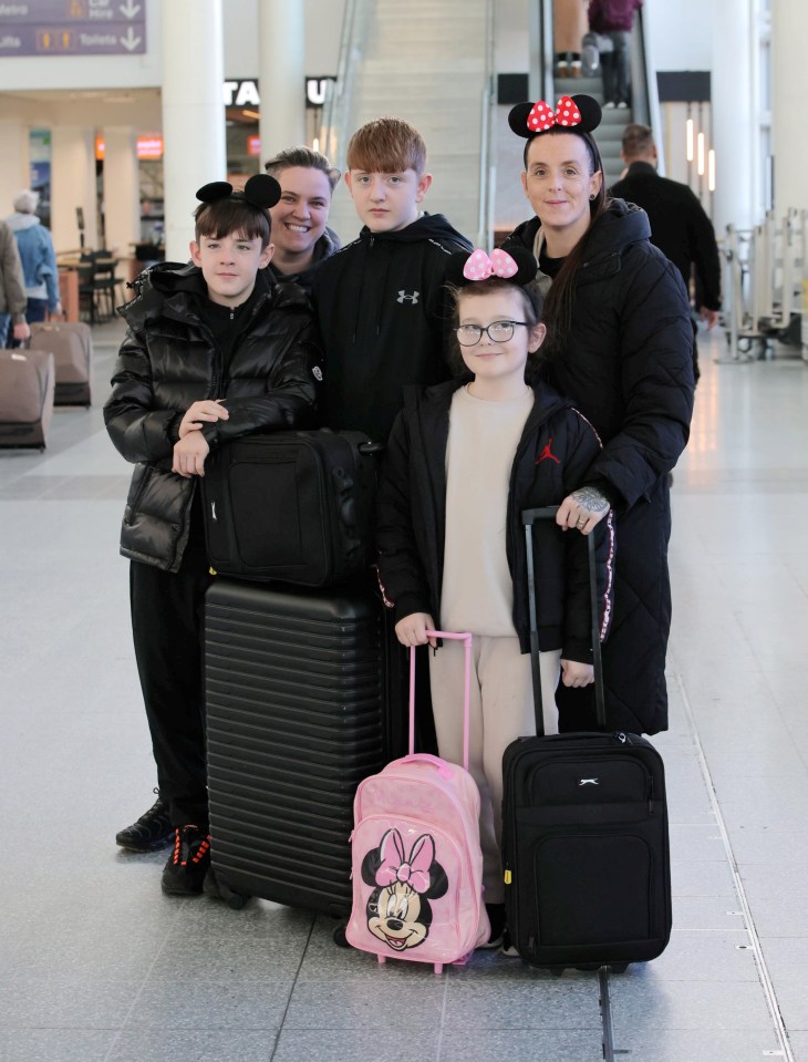 The family at Newcastle Airport ready to jet off