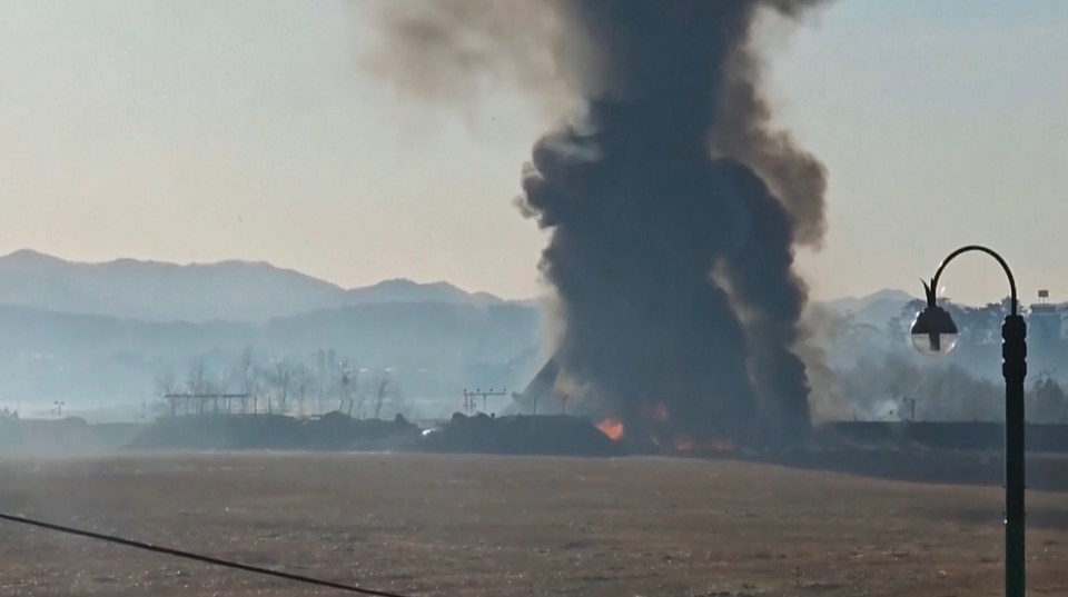 Thick black smoke poured from the wreck following the disaster