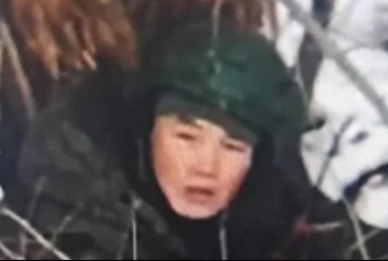 A close-up of the terrified North Korean soldier's face