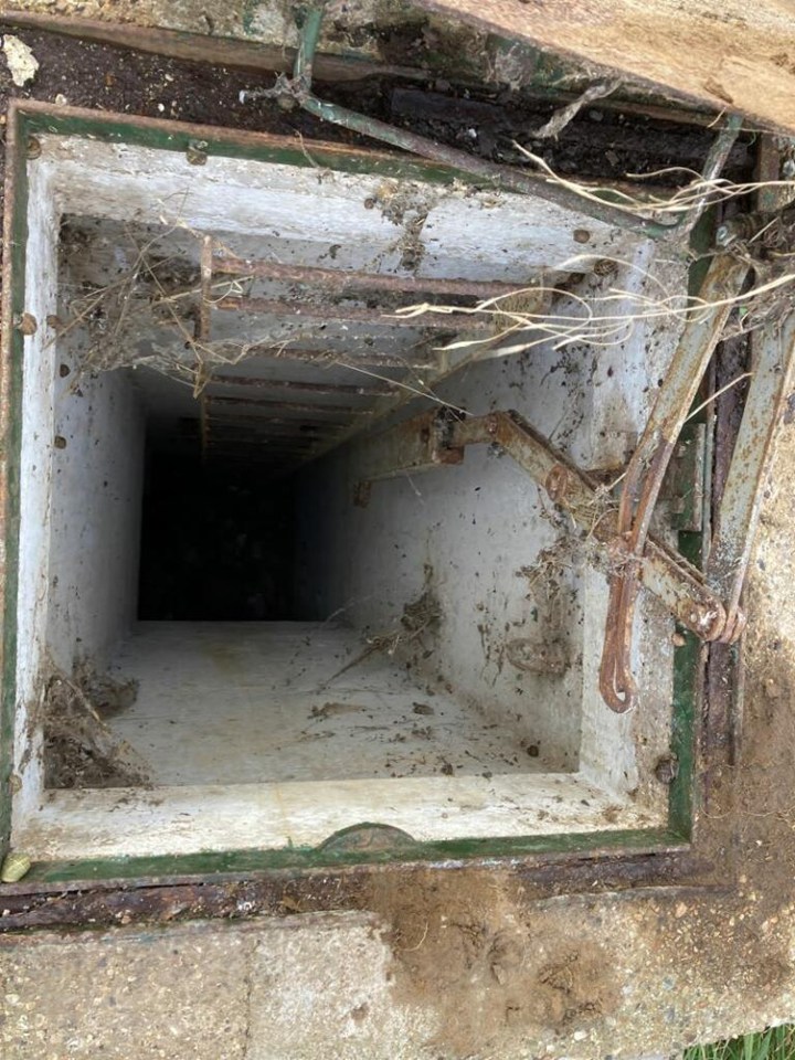 Entrance to a dilapidated 1950s underground bunker, up for auction.