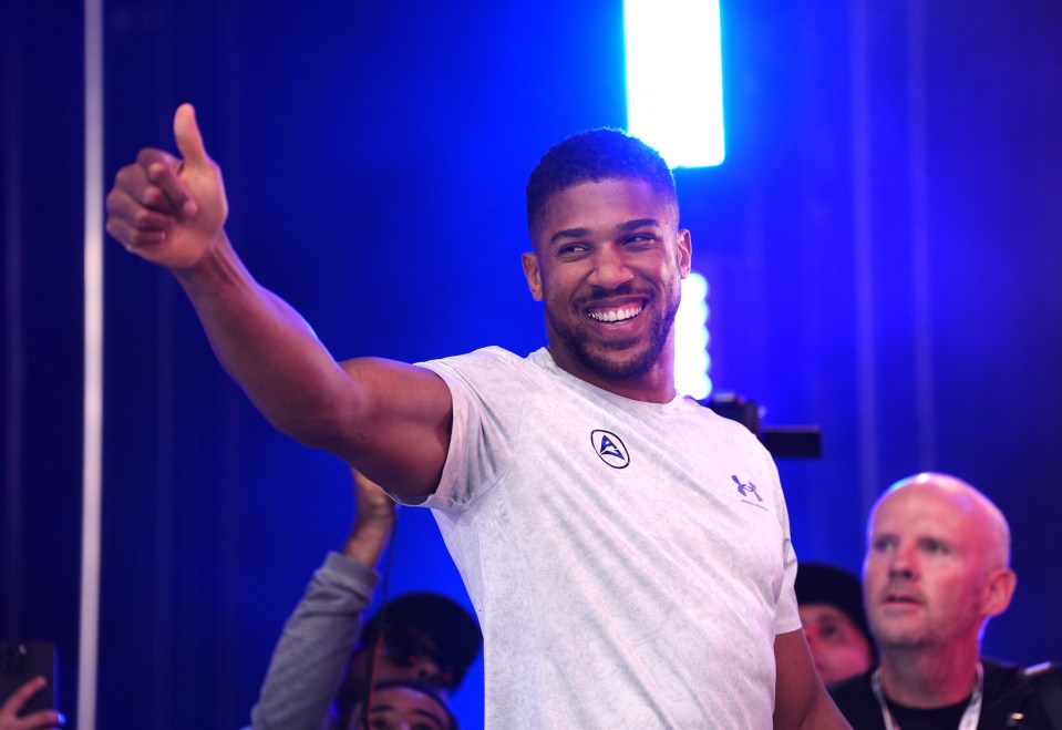 Anthony Joshua giving a thumbs-up.