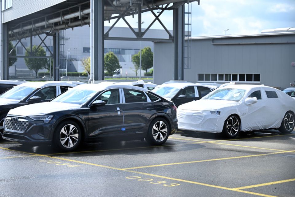 Several of the Audi EVs under wraps at the Brussels factory