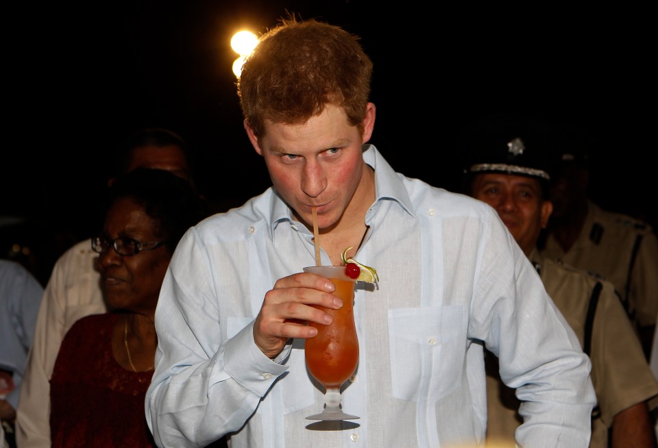 A young Prince Harry enjoys a rum punch cocktail