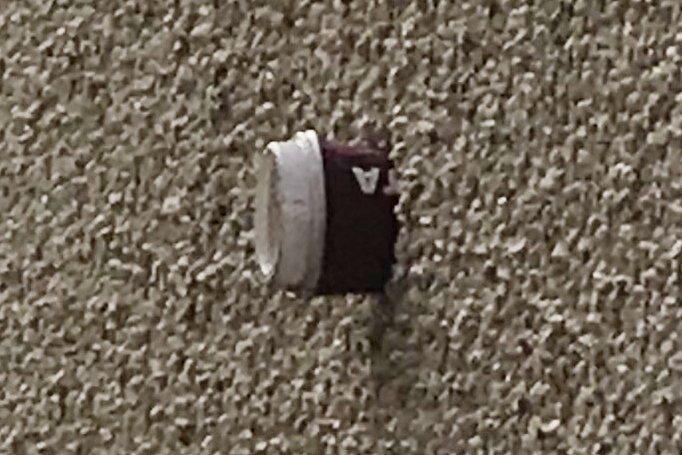 Costa cup sticking out of the wall of Justin’s brand new Persimmon home