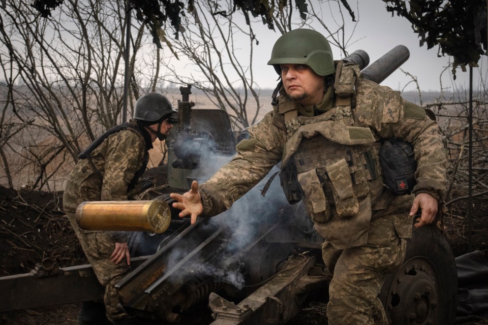 Ukrainian soldiers with the 71st Jaeger Brigade firing at Russian positions