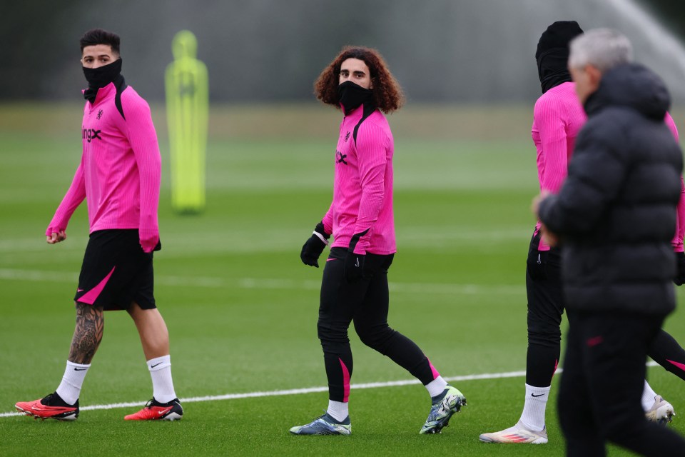 Marc Cucurella and Enzo Fernandez of Chelsea training.