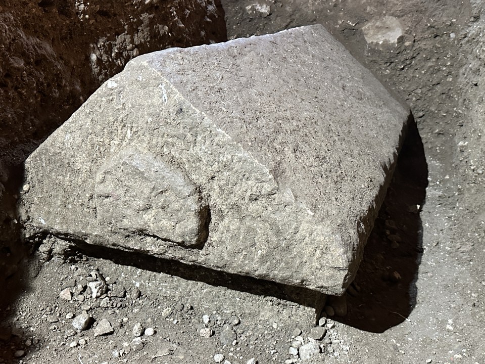 The five-foot deep and six-foot-long coffin has a raised lid