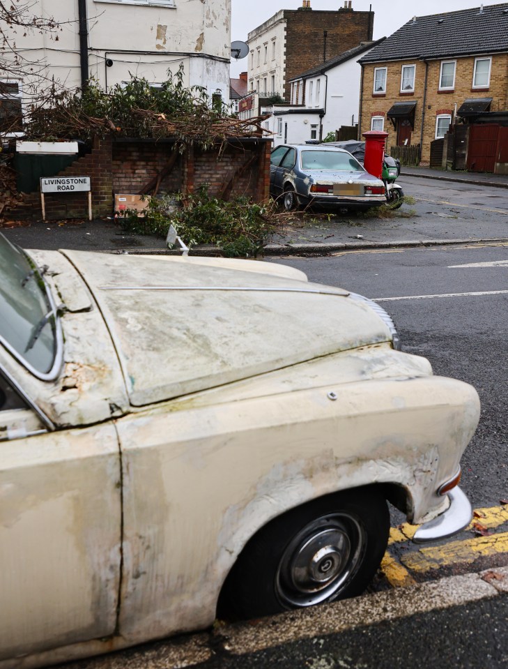 Close up of the old, damp, rusty car