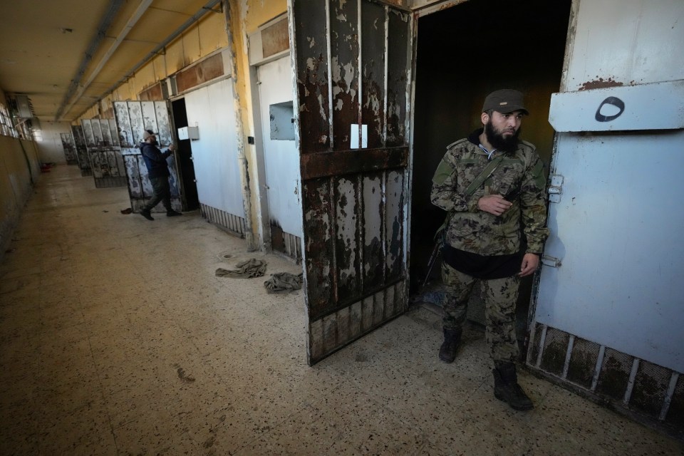 Inside the prison where rebels have broken into to help free jailed those jailed under Assad's regime