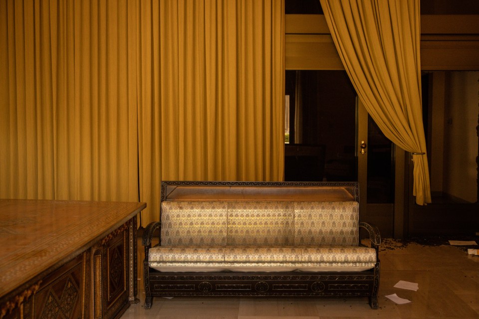 Ornate furniture in a looted room of Bashar al-Assad's Tishreen Palace in Damascus, Syria.