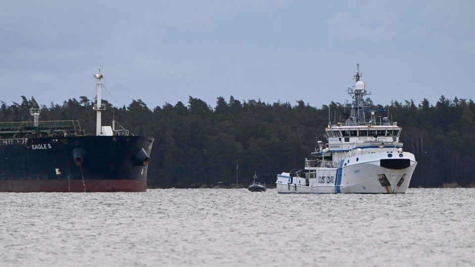 Finnish Coast Guard vessel monitoring the oil tanker Eagle S, suspected of damaging the Estlink 2 electrical cable.