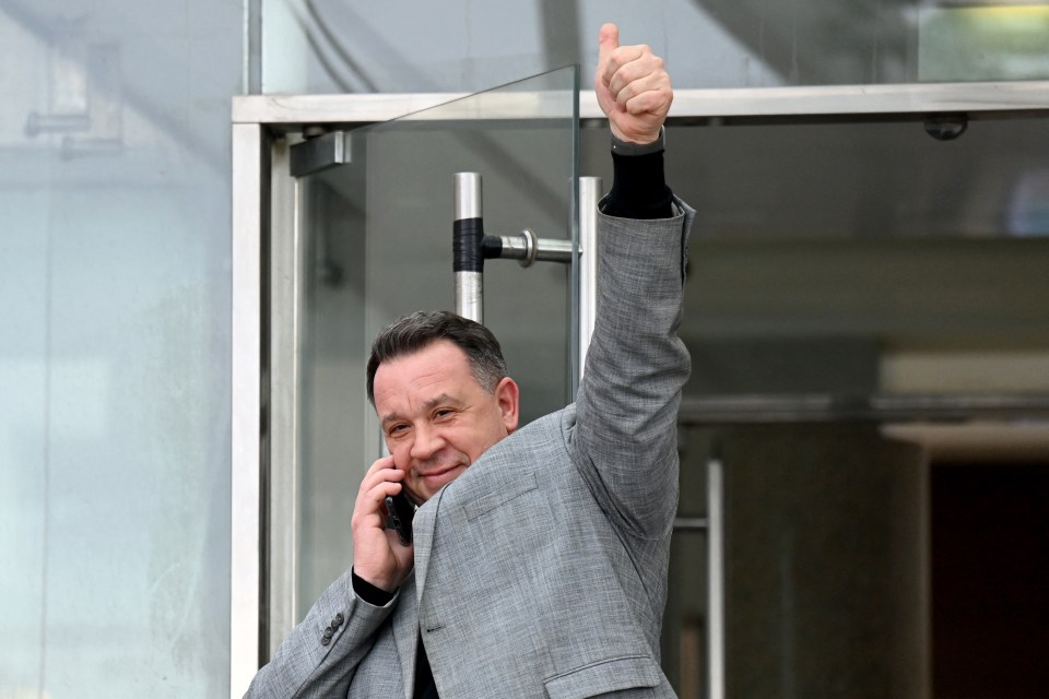 Gisele's son, David Pelicot, waves to supporters gathered outside the courthouse