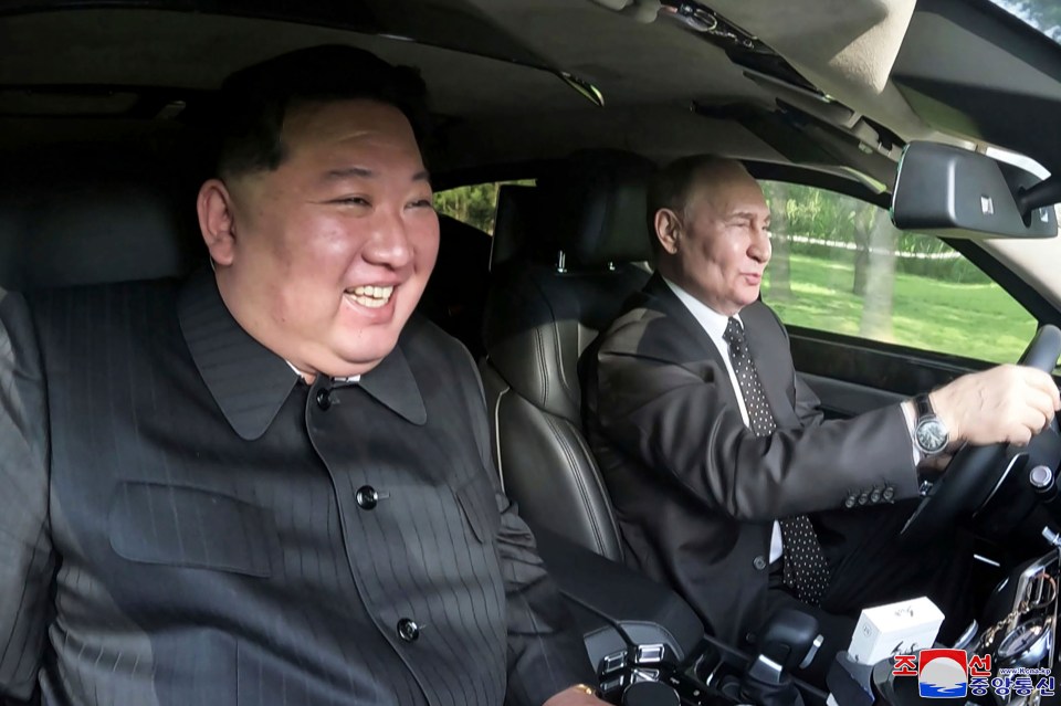 Vladimir Putin and Kim Jong-Un riding a car together in Pyongyang, North Korea, on 19 June, 2024