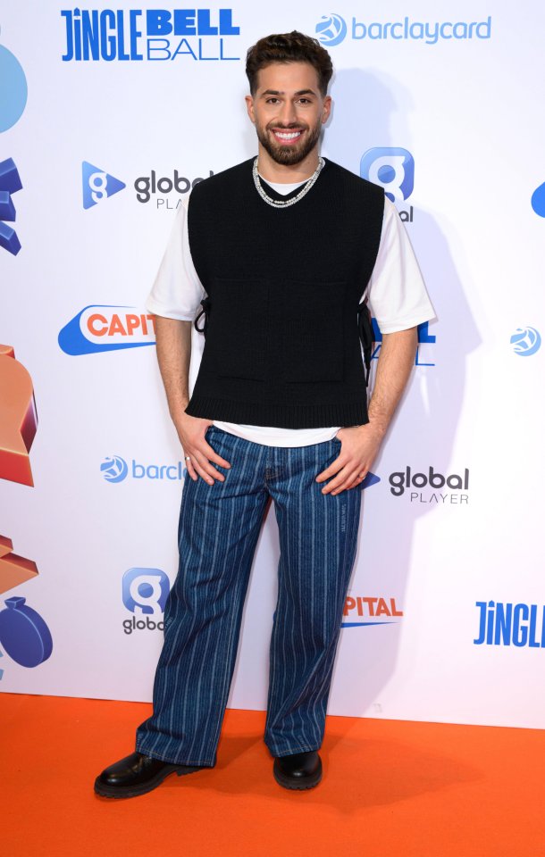 Kem Cetinay opted for a cropped v-neck jumper after his DJ set