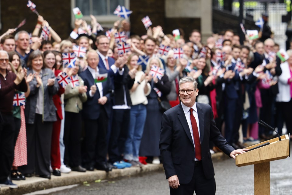 Keir Starmer, newly elected Prime Minister, addresses a cheering crowd outside 10 Downing Street.