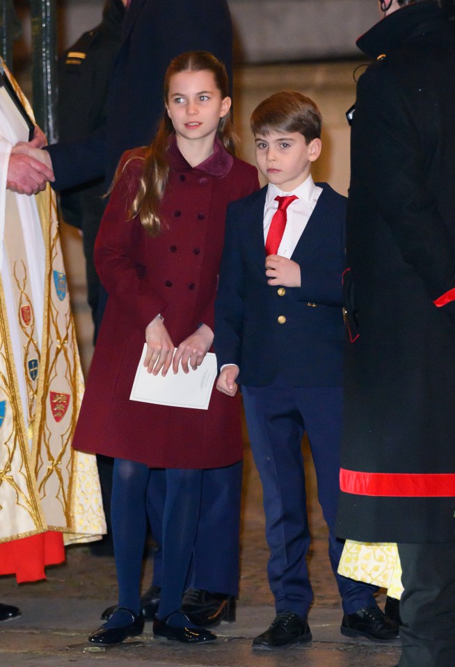 Charlotte stood with her heels posed, a common ballet stance