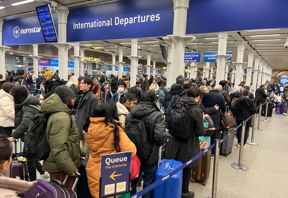 Passengers at St Pancras International station this morning