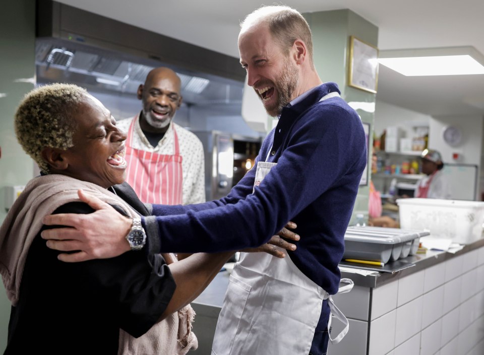 The cheery heir enjoyed a laugh with the staff at The Passage in West London