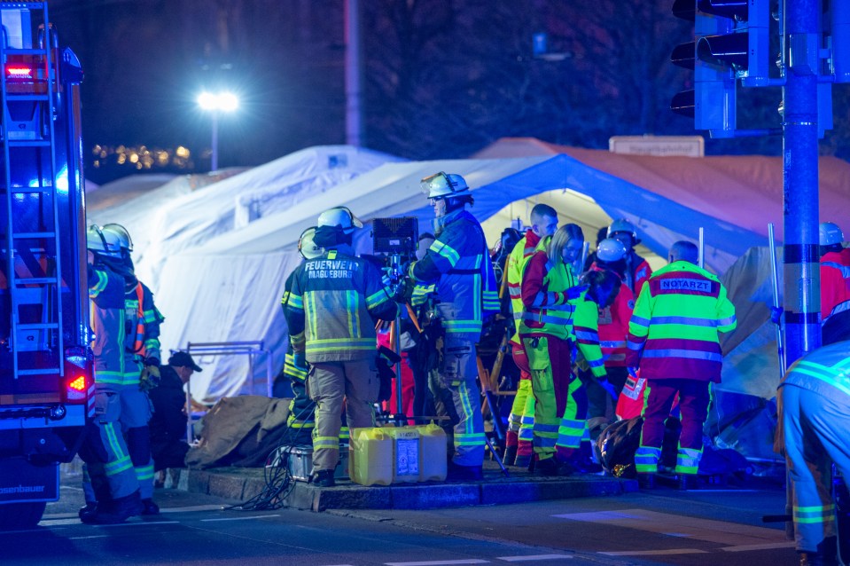 Emergency responders at a Christmas market in Magdeburg, Germany, following a car crash.