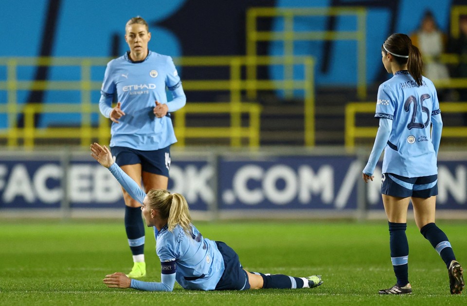 Manchester City's Alex Greenwood injured during a soccer match.