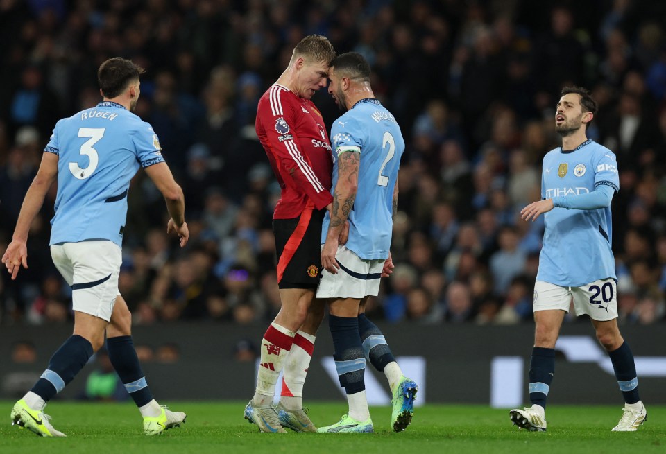 Kyle Walker went down after a soft clash of heads with Rasmus Hojlund