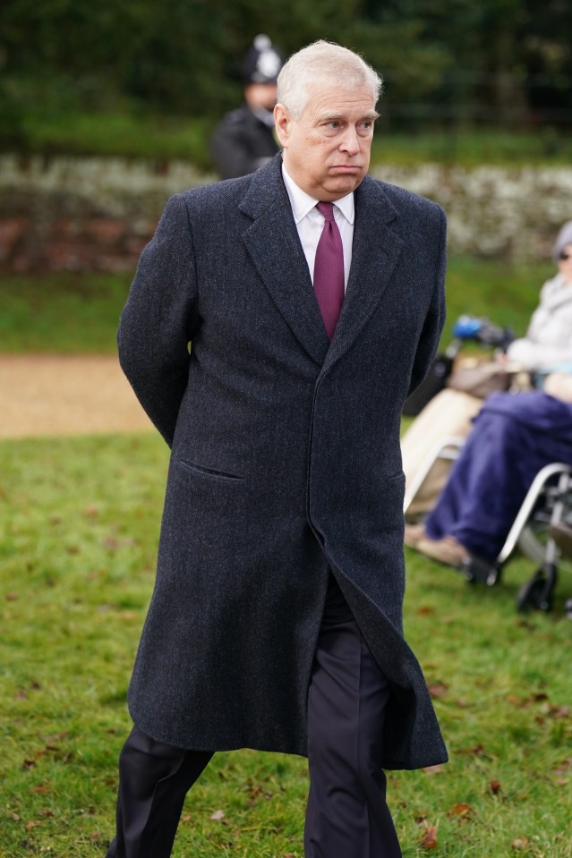 Prince Andrew walking away from the camera.