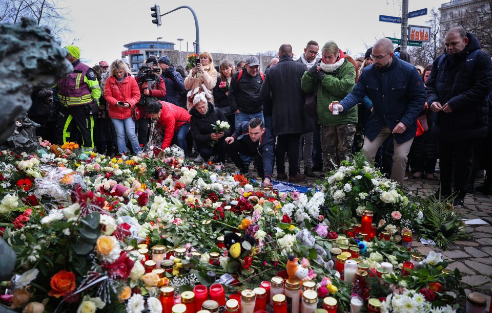 Flowers have been left near the market following the rampage