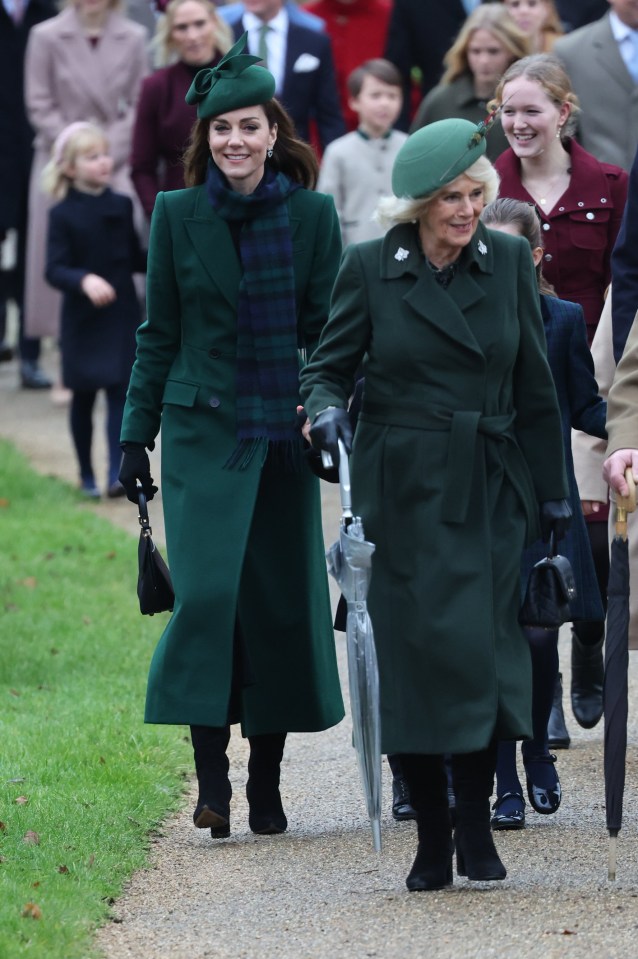 Kate Middleton and Camilla, Queen Consort, walking together at Sandringham Christmas Day church service.