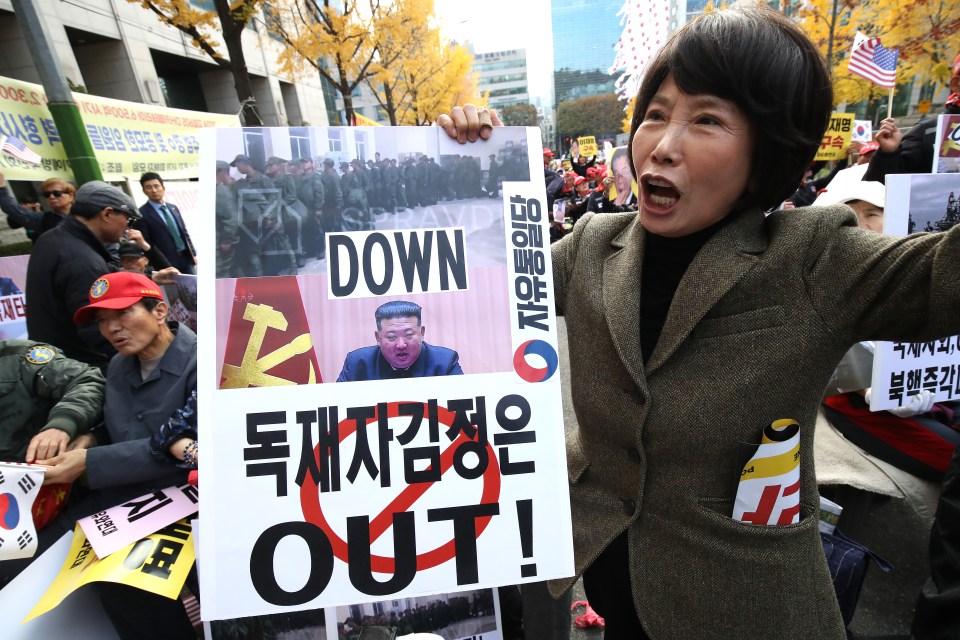 South Korean protesters attend an anti-North Korea rally before opposition Leader Lee Jae-myung faces court on election law violation