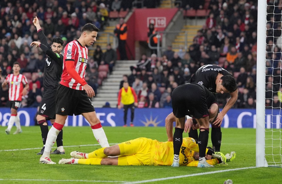 His team-mates and medics rushed over to the keeper