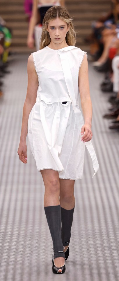 Sunday Rose Kidman Urban modeling a white dress at the Miu Miu Paris Fashion Week show.