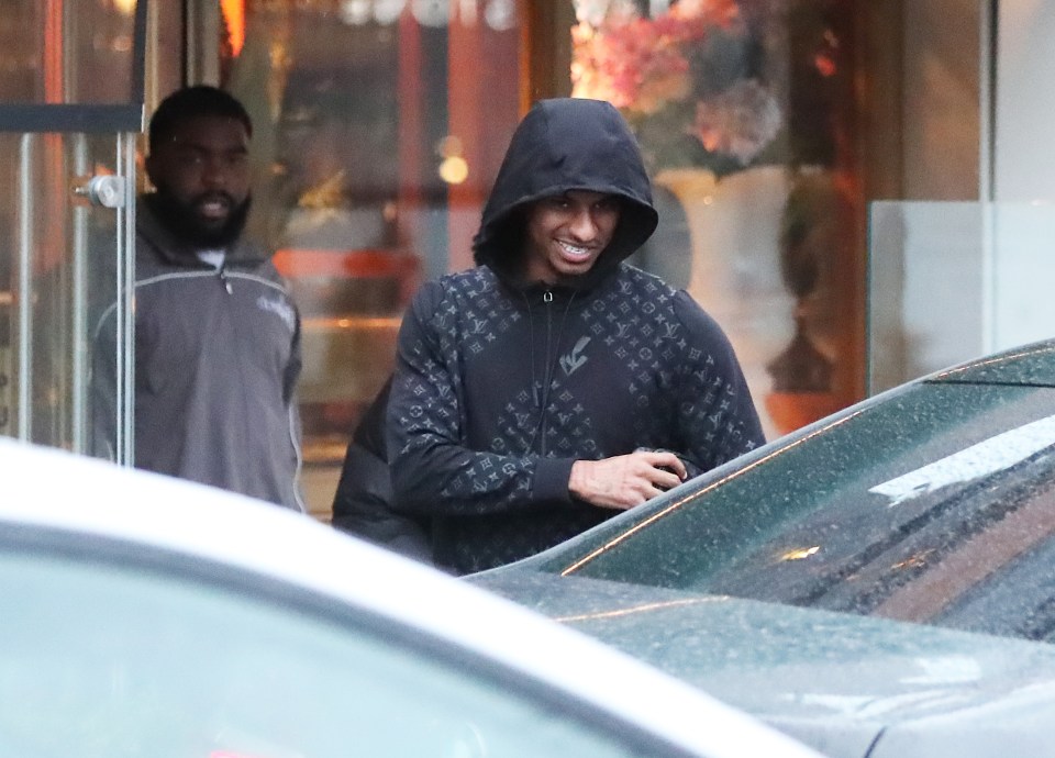 Marcus Rashford was all smiles as he enjoyed lunch out