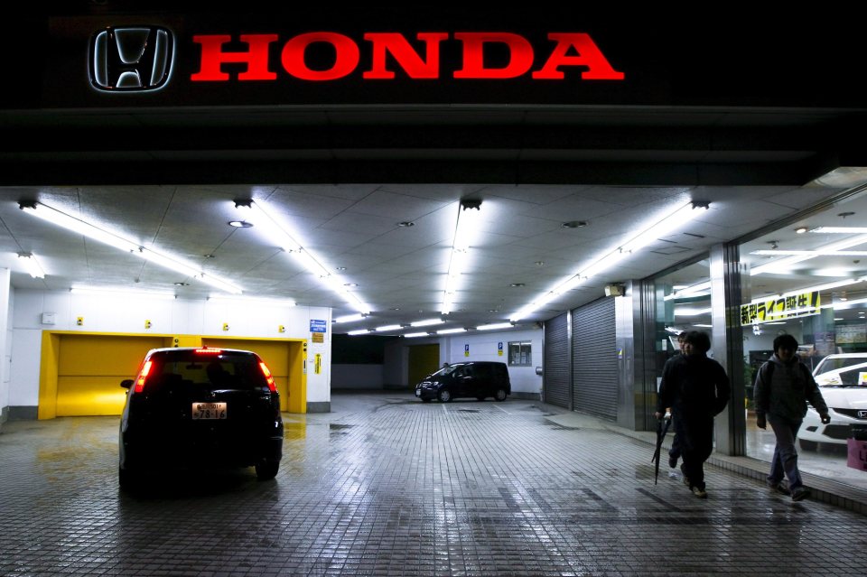 Honda dealership at night in Tokyo, Japan.