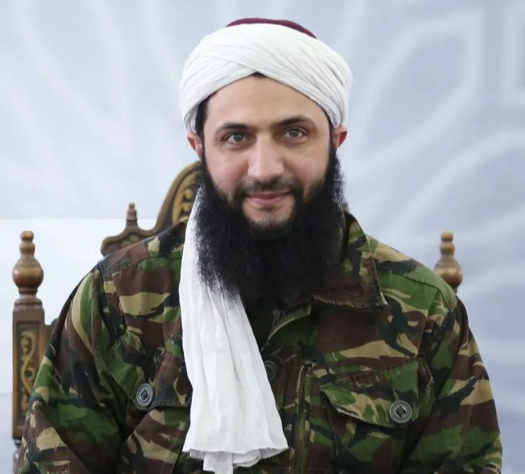 Abu Mohammad al-Jolani at an undisclosed location in 2016 - the first ever picture to be released of him