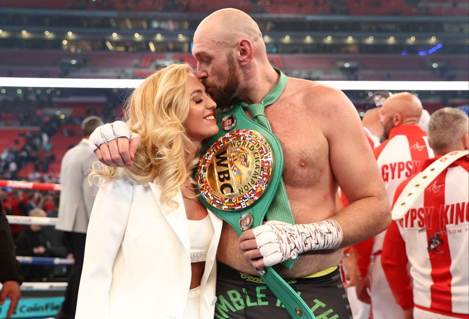 Tyson Fury and his wife Paris celebrating his WBC Heavyweight Championship win.