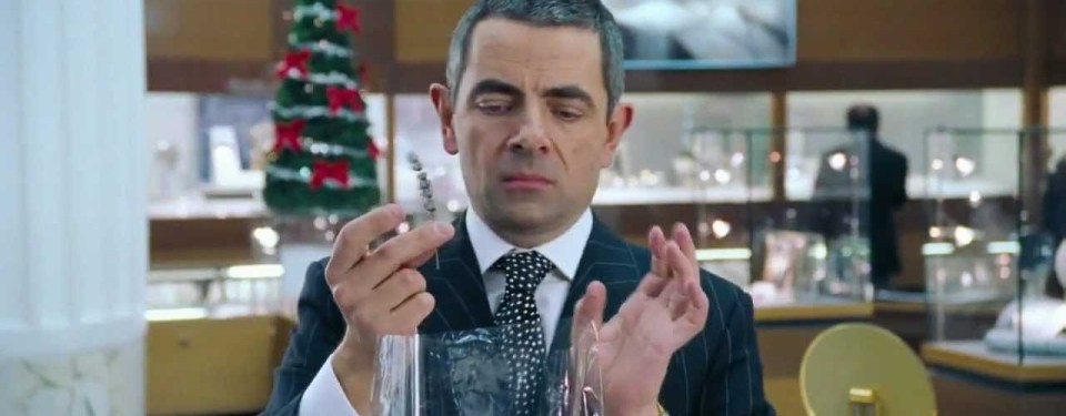 Rowan Atkinson in a jewelry store scene from Love Actually.