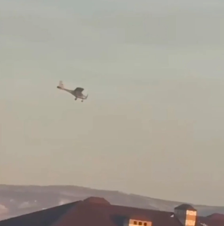 The WW2-style plane was captured soaring through the sky